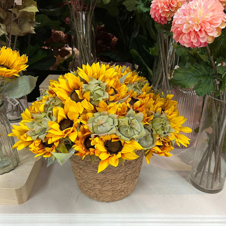 artifical sunflowers in basket