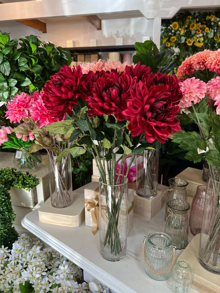 fake flowers in a glass vase