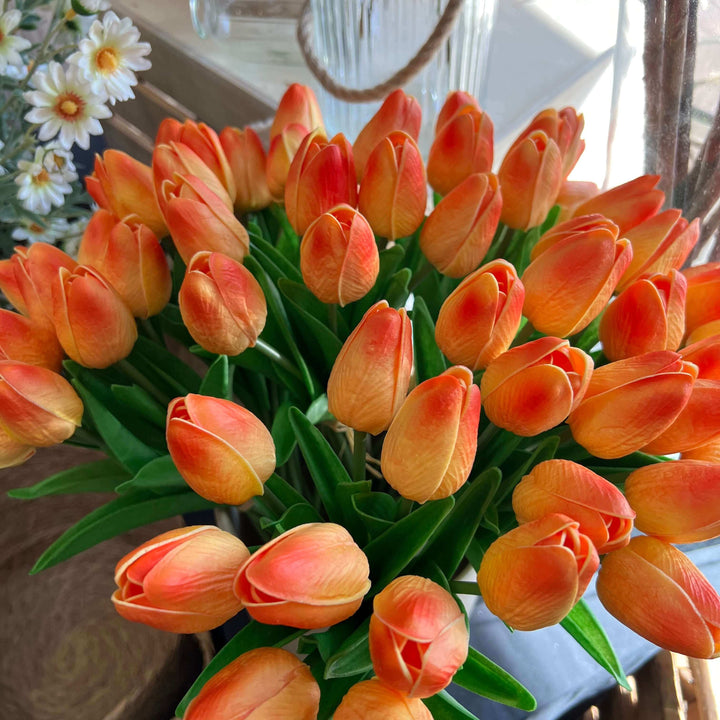 fake orange tulip bunch