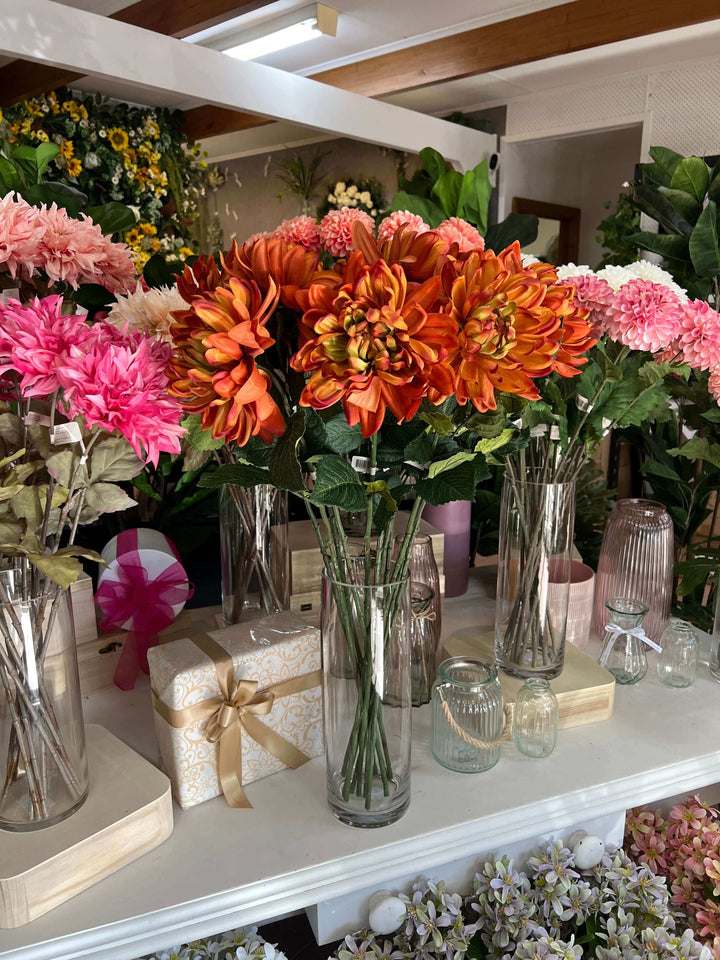 glass vase with dahlias